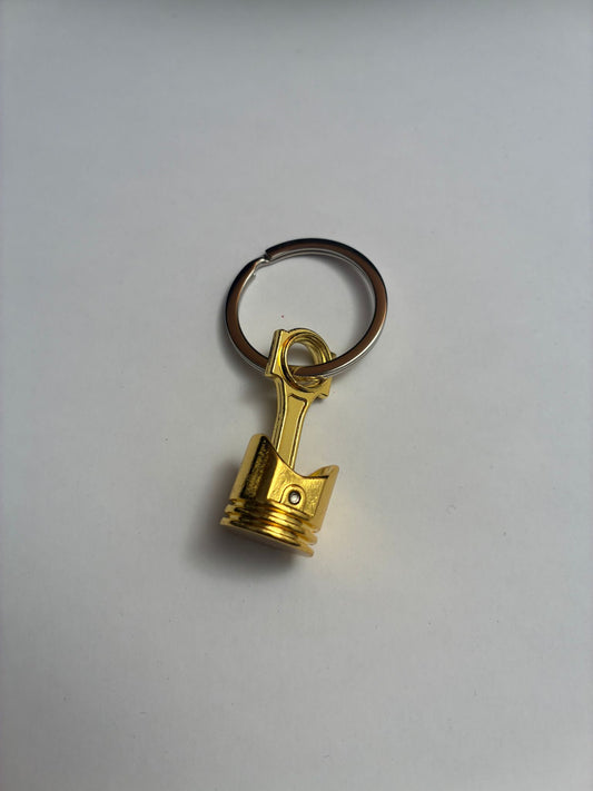 Kolben - Schlüsselanhänger - Goldoptik